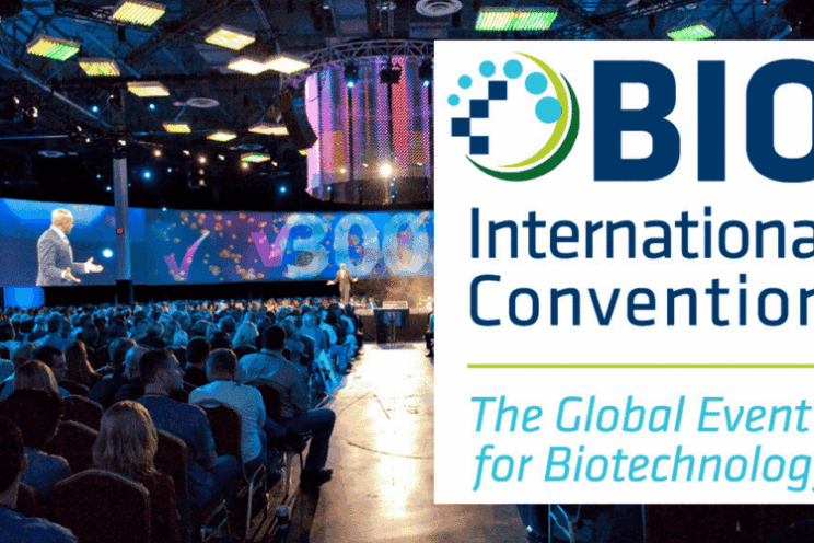 A graphic composition showing event attendees at a venue as the background image with a logo for BIO International Convention over the top.